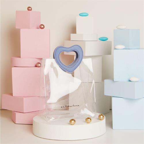 Borsetta in acrilico con manico similpelle blu