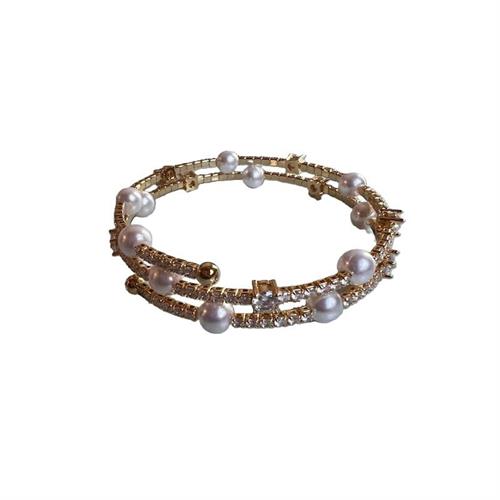 Bracciale manetta gold con strass, perla e strass grande