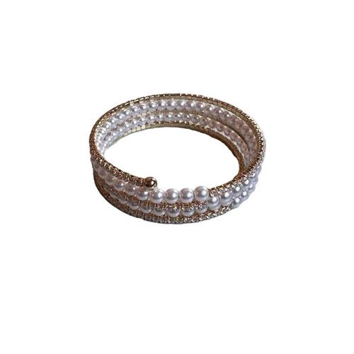 Bracciale manetta gold con un giro di perle e strass alternati