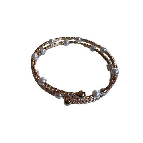Bracciale manetta gold con 9 strass e una perlina