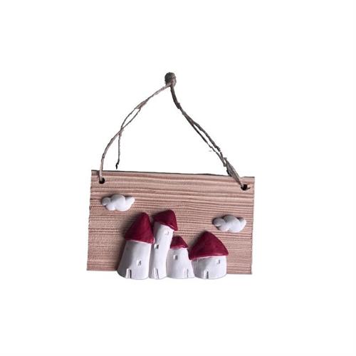 Tavoletta in legno da appendere con villaggio gesso e tetti rossi