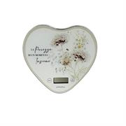 Bilancia a cuore con decoro floreale verde